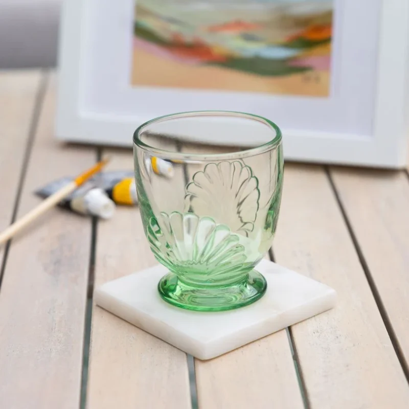 La Rochere Belle-ile tumbler in green on coaster